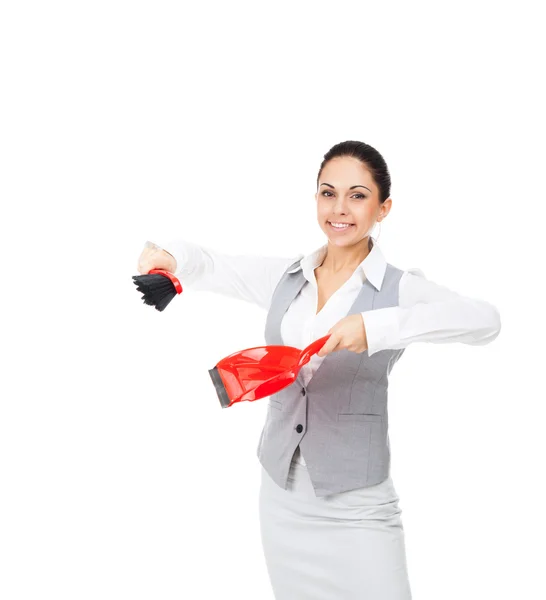 Businesswoman holding red scoop and broom — Stockfoto