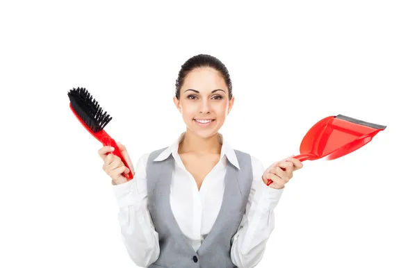 Businesswoman holding red scoop and broom — Stock Photo, Image