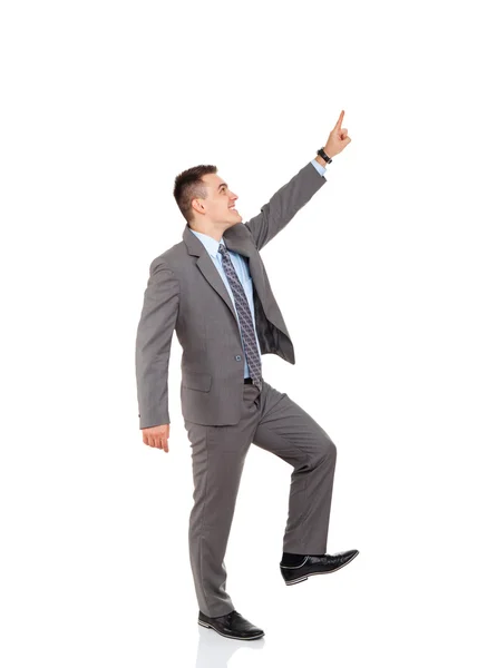 Hombre de negocios señalar el dedo al espacio de copia vacío — Foto de Stock