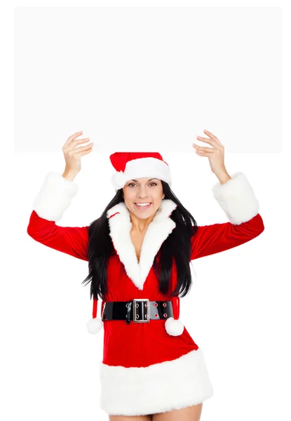 Vrouw in santa clausule kostuum bedrijf leeg bord — Stockfoto