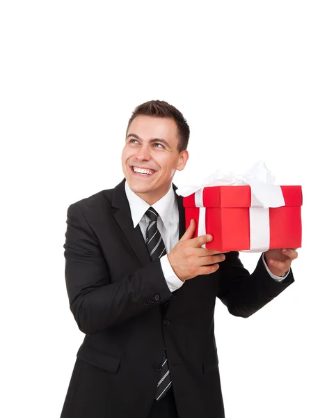 Бизнесмен взволнован держать подарочную коробку — стоковое фото