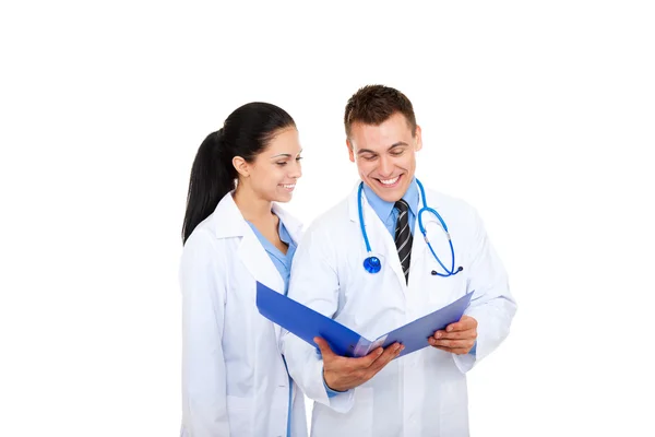 Medical team, woman and man reading report prescription documents — Stock Photo, Image