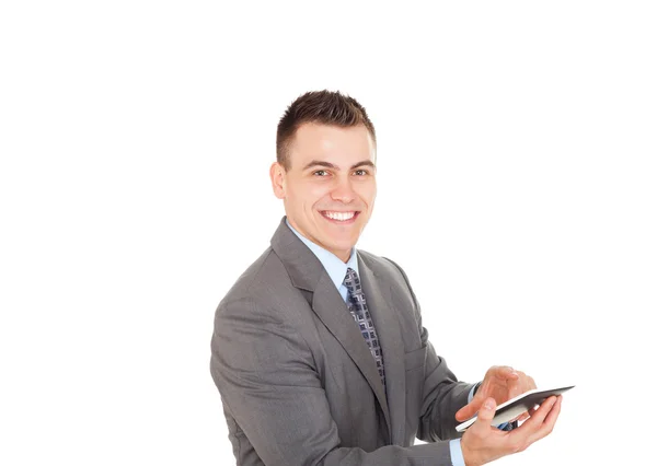 Hombre de negocios joven guapo usando tableta —  Fotos de Stock