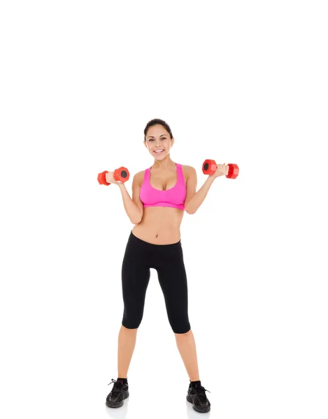 Young healthy girl doing dumbbells exercises — Stock Photo, Image