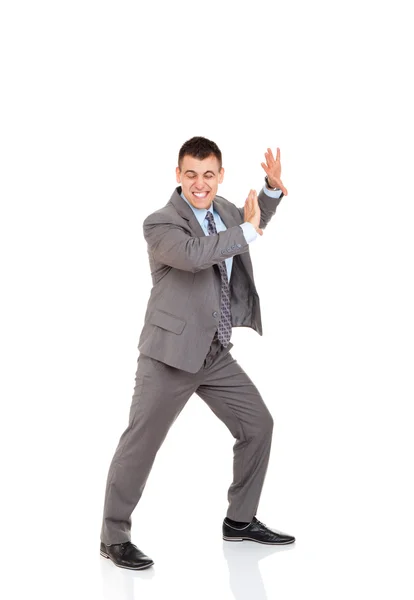 Guapo hombre de negocios sonrisa empujando espacio de copia — Foto de Stock