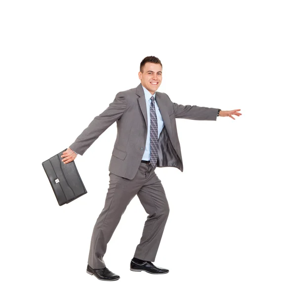 Concept of businessman reaching for something Royalty Free Stock Photos