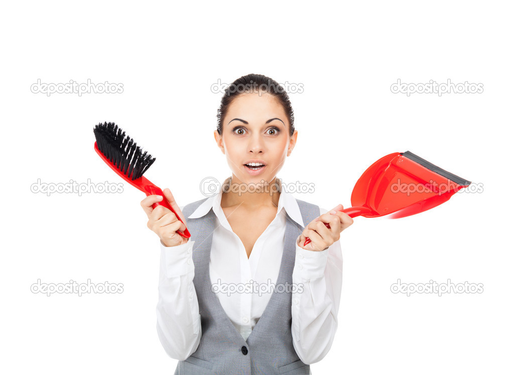 Businesswoman holding red scoop and broom and dust pan