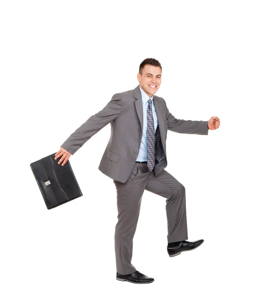 Handsome businessman run with briefcase — Stock Photo, Image