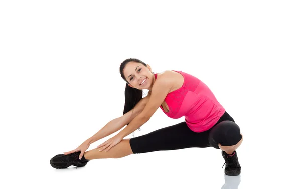 Menina saudável fazendo exercícios de alongamento — Fotografia de Stock