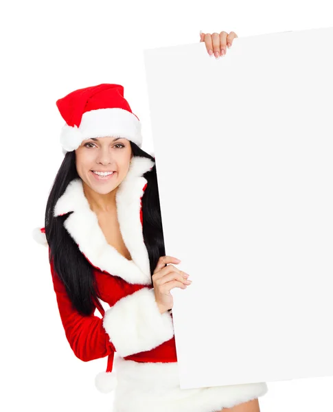 Vrouw in santa clausule kostuum bedrijf leeg bord — Stockfoto