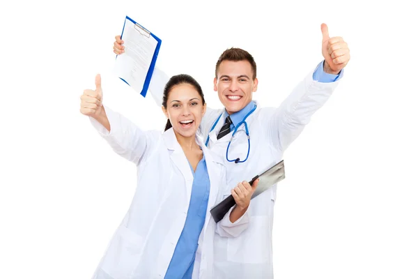 Excited medical team showing thumb up gesture, — Stock Photo, Image