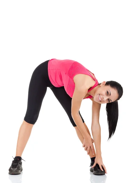 Menina saudável fazendo exercícios de alongamento — Fotografia de Stock