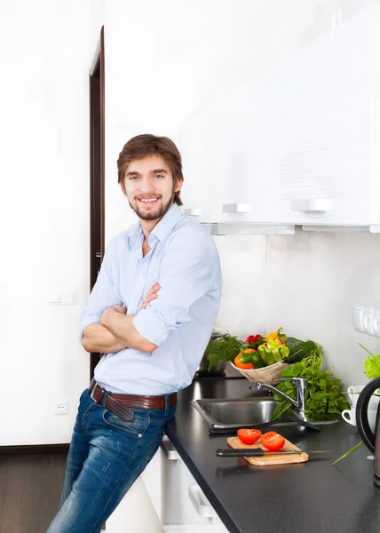 Man in the kitchen happy smile — Stock Photo, Image