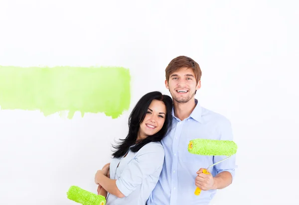 Paar verf in groene kleur wit muur — Stockfoto