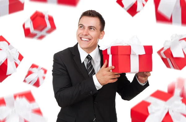 Homem de negócios segurar caixa de presente — Fotografia de Stock