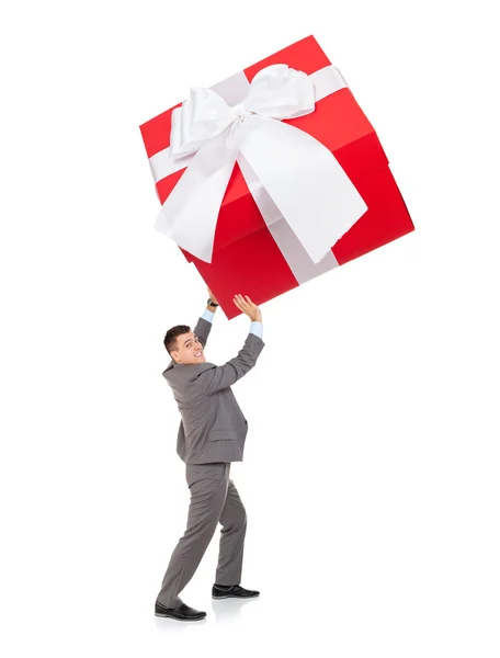 Affärsman push stora presentförpackning — Stockfoto