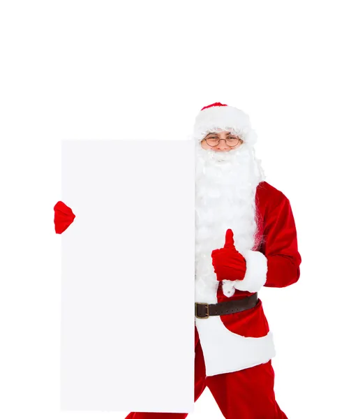 Weihnachtsmann hält Banner hoch und zeigt Daumen hoch — Stockfoto