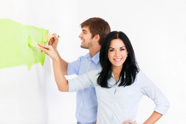 Paar verf in groene kleur wit muur — Stockfoto