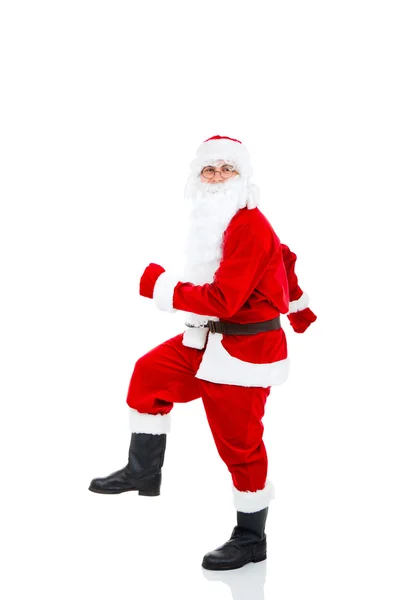 Santa Claus making step — Stock Photo, Image