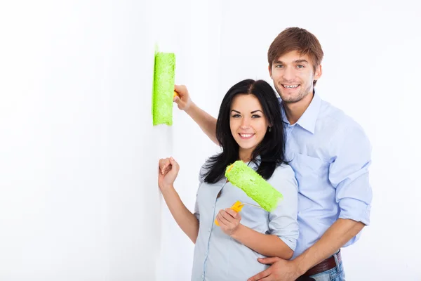 Couple paint in green color white wall — Stock Photo, Image