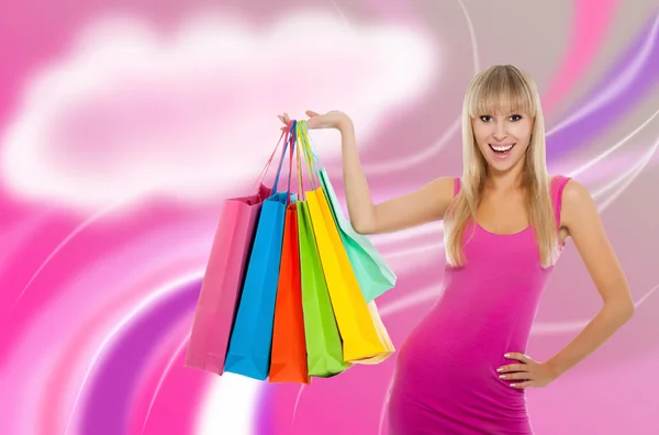 Hermosa mujer con coloridas bolsas de compras — Foto de Stock