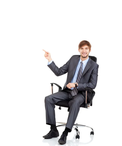 Businessman pointing to the copy space — Stock Photo, Image