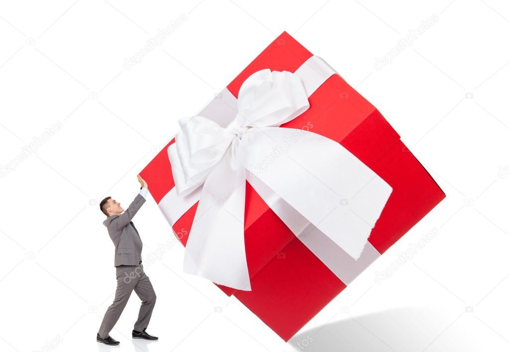 businessman push big gift box stock photo mast3r 31739935