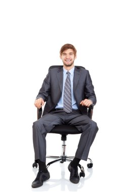 Businessman happy smile sitting in chair