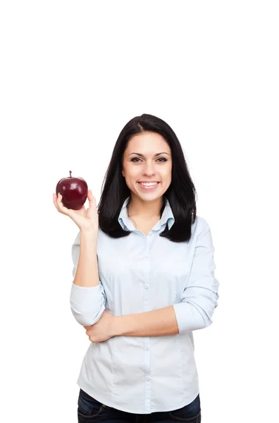 Mujer joven sostiene manzana roja fresca — Foto de Stock