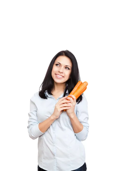 Young woman hold carrot — Stock Photo, Image