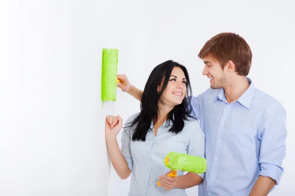 Couple paint in green color white wall — Stock Photo, Image