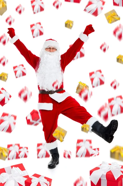Santa claus dansen en cadeau vallen vliegen rond — Stockfoto