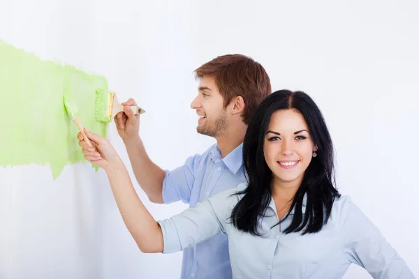 Couple paint in green color white wall — Stock Photo, Image