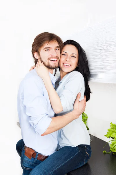 Couple at their kitchen home — Stock Photo, Image