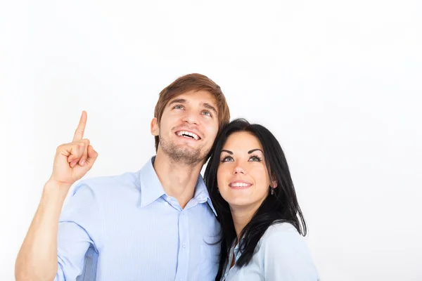 Couple smile point finger up Stock Picture