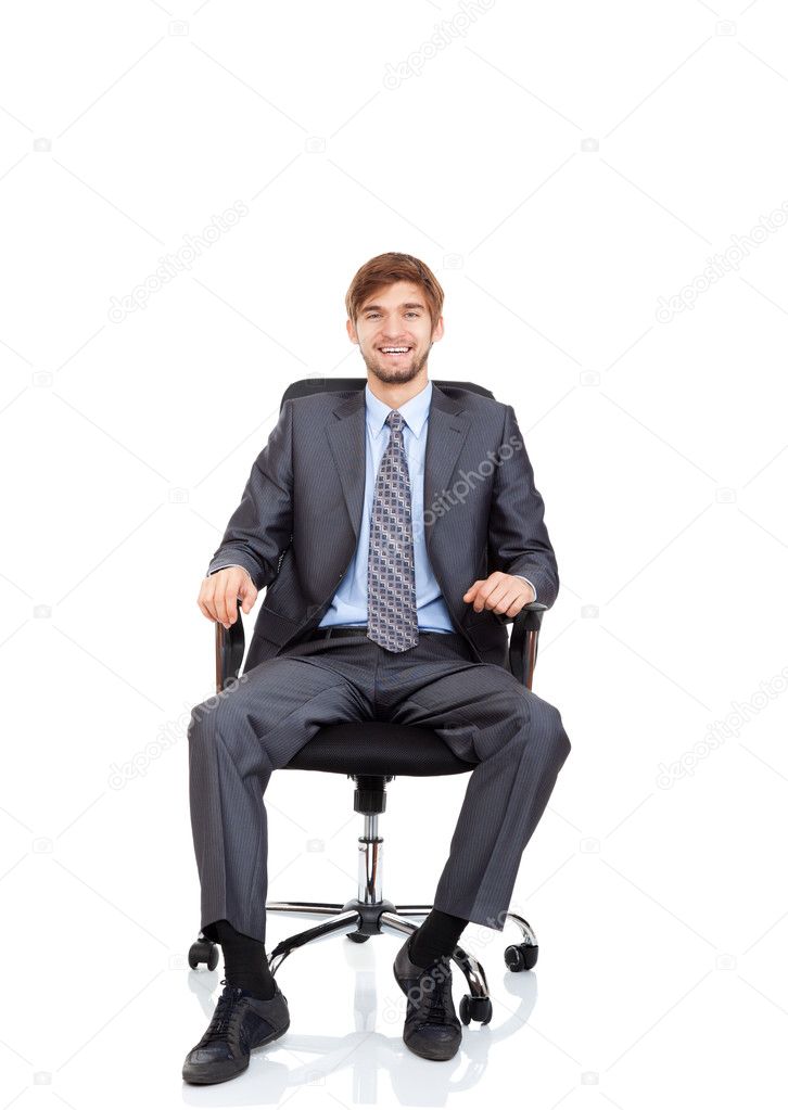 Businessman happy smile sitting in chair Stock Photo by ©mast3r 31742831