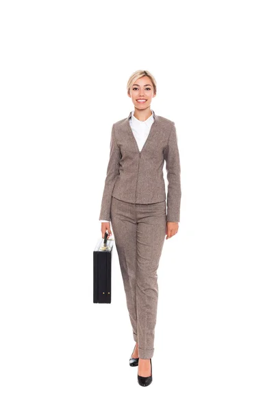 Business woman smilling and holding black briefcase — Stock Photo, Image