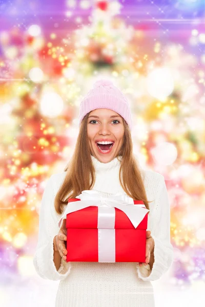 Christmas winter girl hold red gift — Stock Photo, Image