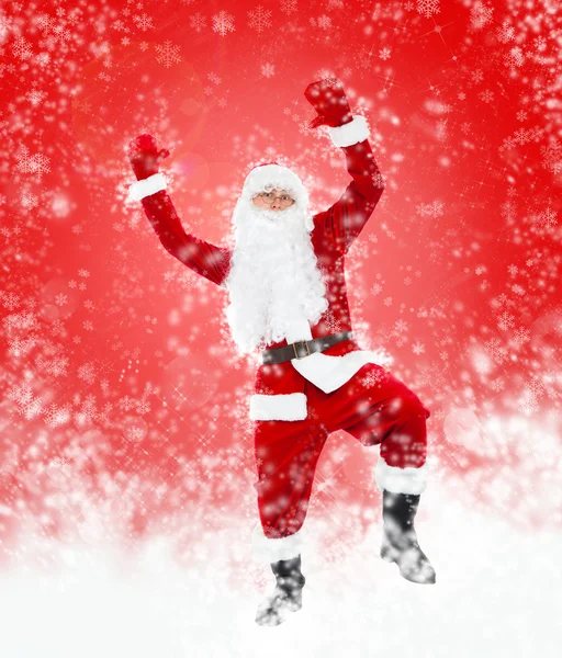 Happy Santa Claus full length portrait dancing — Stock Photo, Image