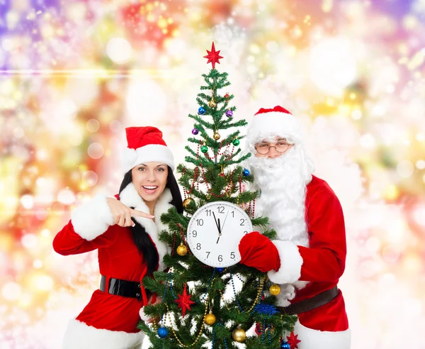 Babbo Natale ragazza tenere orologio — Foto Stock