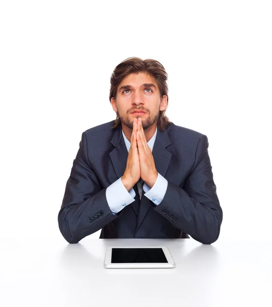 Businessman serious clasp hands pray looking up — Stock Photo, Image
