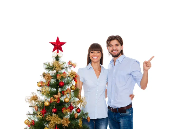 Christmas holiday happy couple, new year decorated tree — Stock Photo, Image