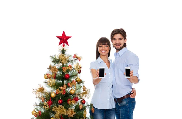 Christmas holiday happy couple, new year decorated tree — Stock Photo, Image