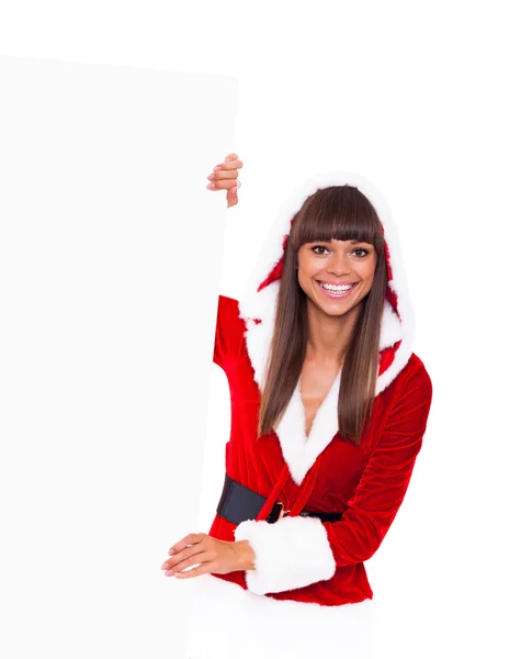 Natal menina sorriso segurar placa em branco espaço de cópia vazio — Fotografia de Stock
