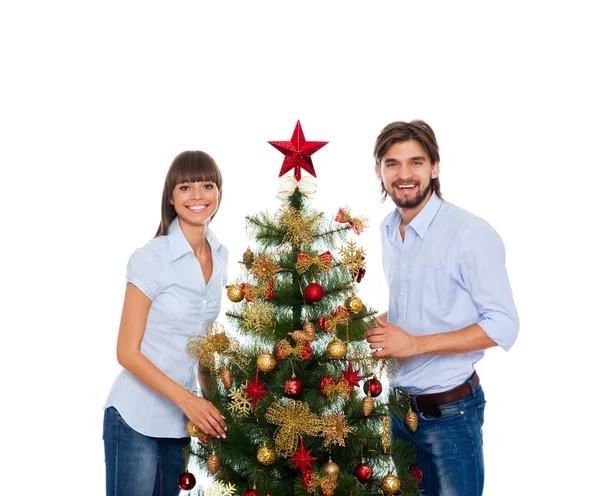 Vacaciones de Navidad feliz pareja, árbol decorado año nuevo —  Fotos de Stock