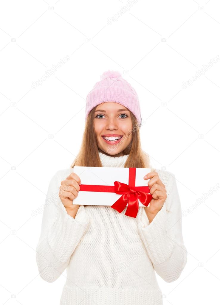 Winter girl happy smile hold red gift card