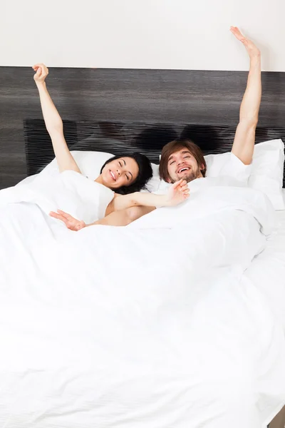 Pareja en la cama — Foto de Stock