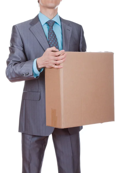 Empresário transportando caixa de papel — Fotografia de Stock
