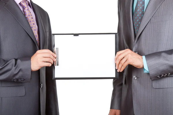 Businessmen holding blank signboard — Stock Photo, Image