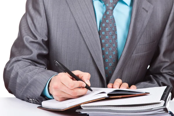 Hombre de negocios sentado en la mesa Fotos De Stock